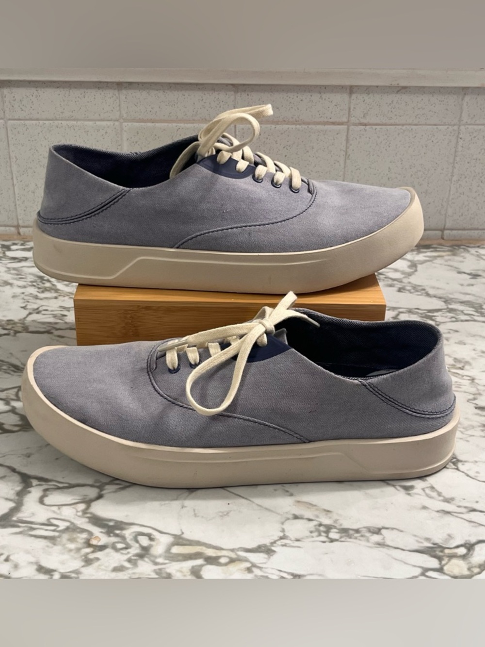 OluKai Tradewind Men's Everyday Sneaker. Chambray Linen Upper in Grey